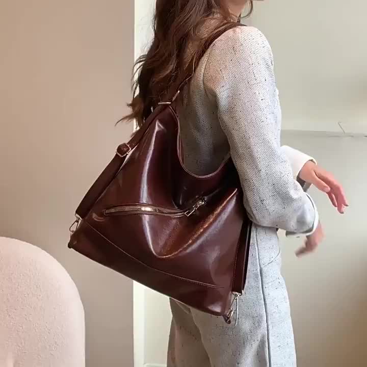 Tas jinjing tiga-dalam-satu untuk wanita ransel komuter berkapasitas besar baru tas selempang bahu rantai warna kontras tas bucket kulit retro