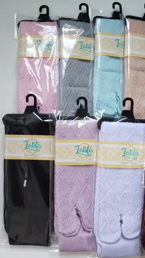 Kaos kaki Jempol Embos Motif Timbul Dewasa Panjang Sebetis Wanita Tebal  Katun
