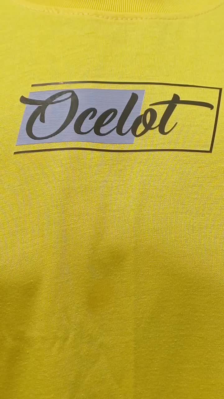Kaos Oblong Lengan Pendek Pria Wanita Dewasa Bahan PE 24s Semi Katun Ukuran L,XL,XXL Distro, Baju Atasan Motif Sablon - Ocelot Keren Hitam