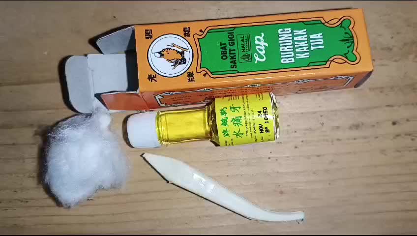 Perawatan Gigi Cap Burung Kakak Tua 2ml - Bonus Kapas Tutul