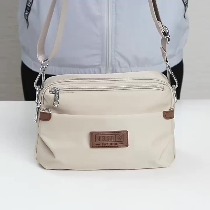 ￼Jielshi Tas Selempang-Slingbag 9037 Wanita Bahan Parasut Premium Terbaru Simpel Model Terbaru